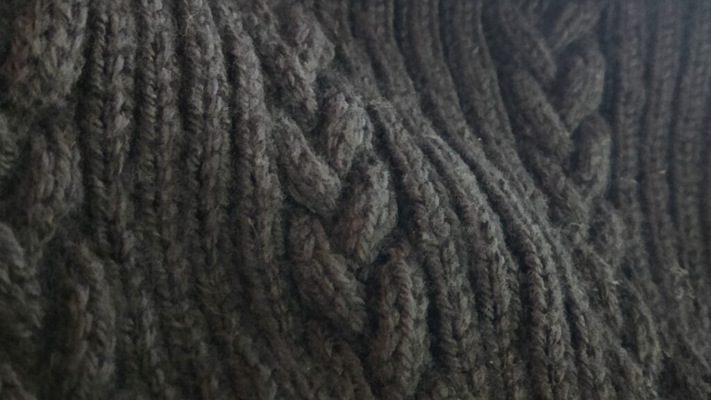 The Hopsmere sweater sleeve is now underway! Close-up image of the braided cabling